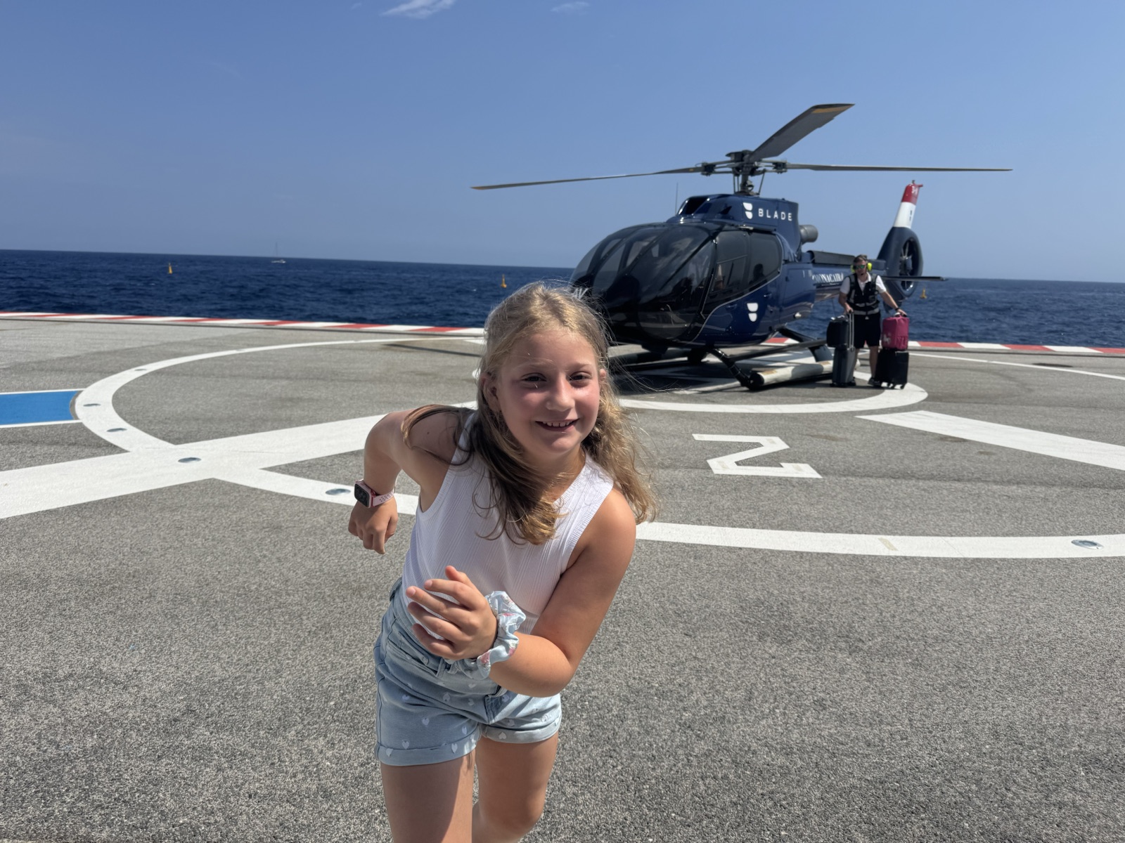 Mathilde on the helipad with the helicopter